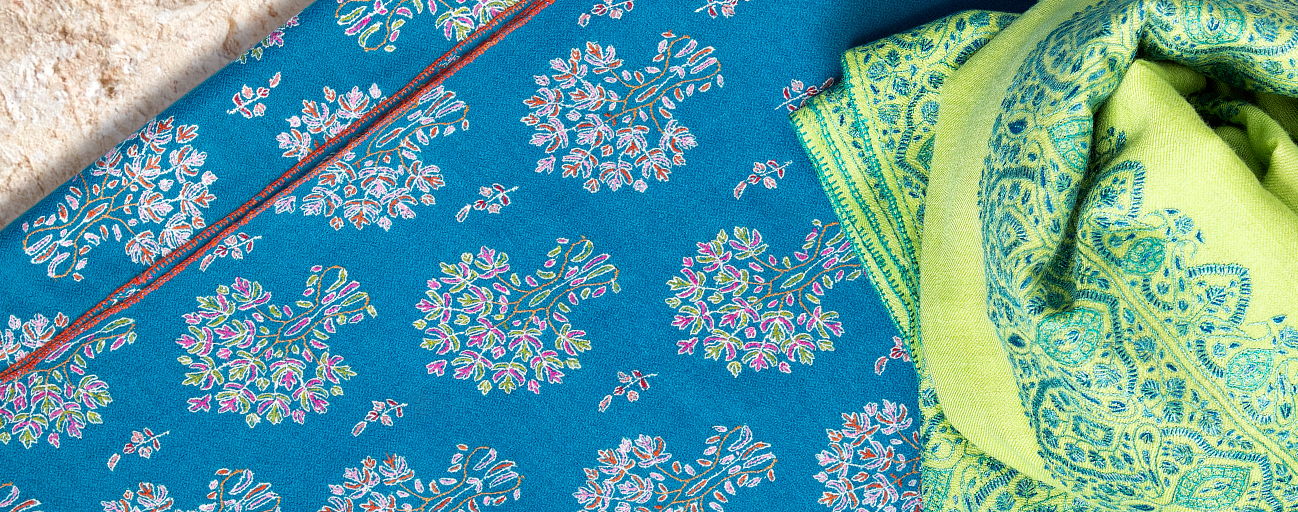 Turquoise and lime pashmina shawls with complex hand embroidery.