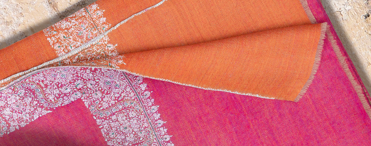 Reversible two-tone orange and pink pashmina shawl with jamawar embroidered border