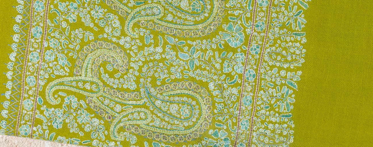 Olive green pashmina shawl with exquisite complex embroidery all over.